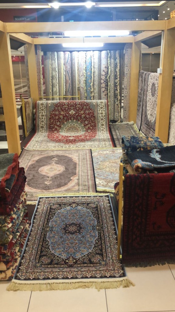 Turquoise field arabesque carpet